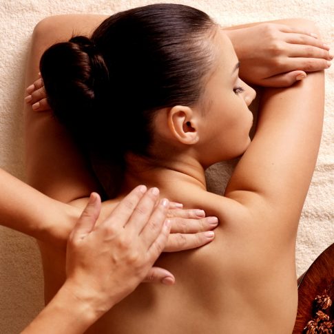 Masseur,Doing,Massage,On,Woman,Body,In,The,Spa,Salon.